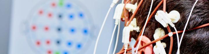 Volunteer undergoing an EEG recording of the brain